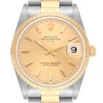 Rolex Oyster Perpetual Date Champagne Stick Dial on Strap Ref 15223 with Papers  1990