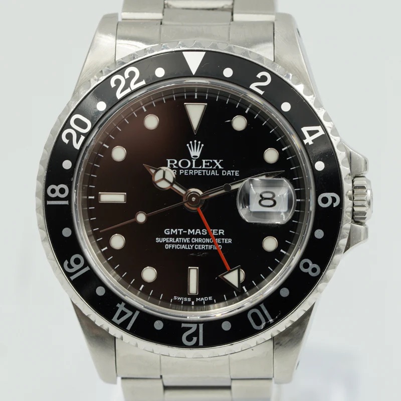 19138923_askahxztmpcwlj3yst2gcbqicrtw.jpg Rolex GMT-Master Black Dial on Oyster Ref 16700 with Papers 1997 - Image 1