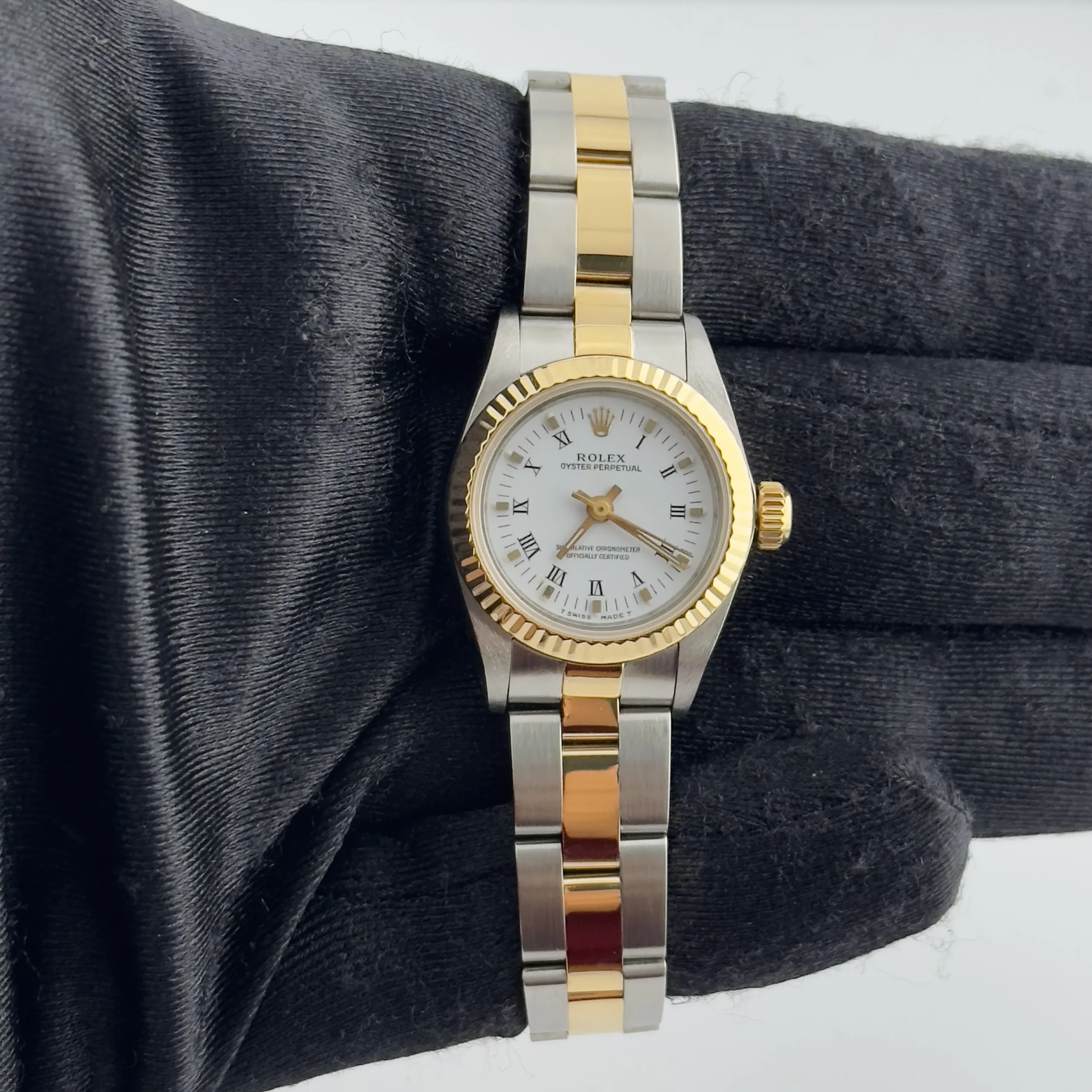 19138938_nrpudk063w231v73dbzhsyy0au0t.webp Rolex Oyster Perpetual White Roman Dial on Oyster Ref 67193 with Papers 1992 - Image 1