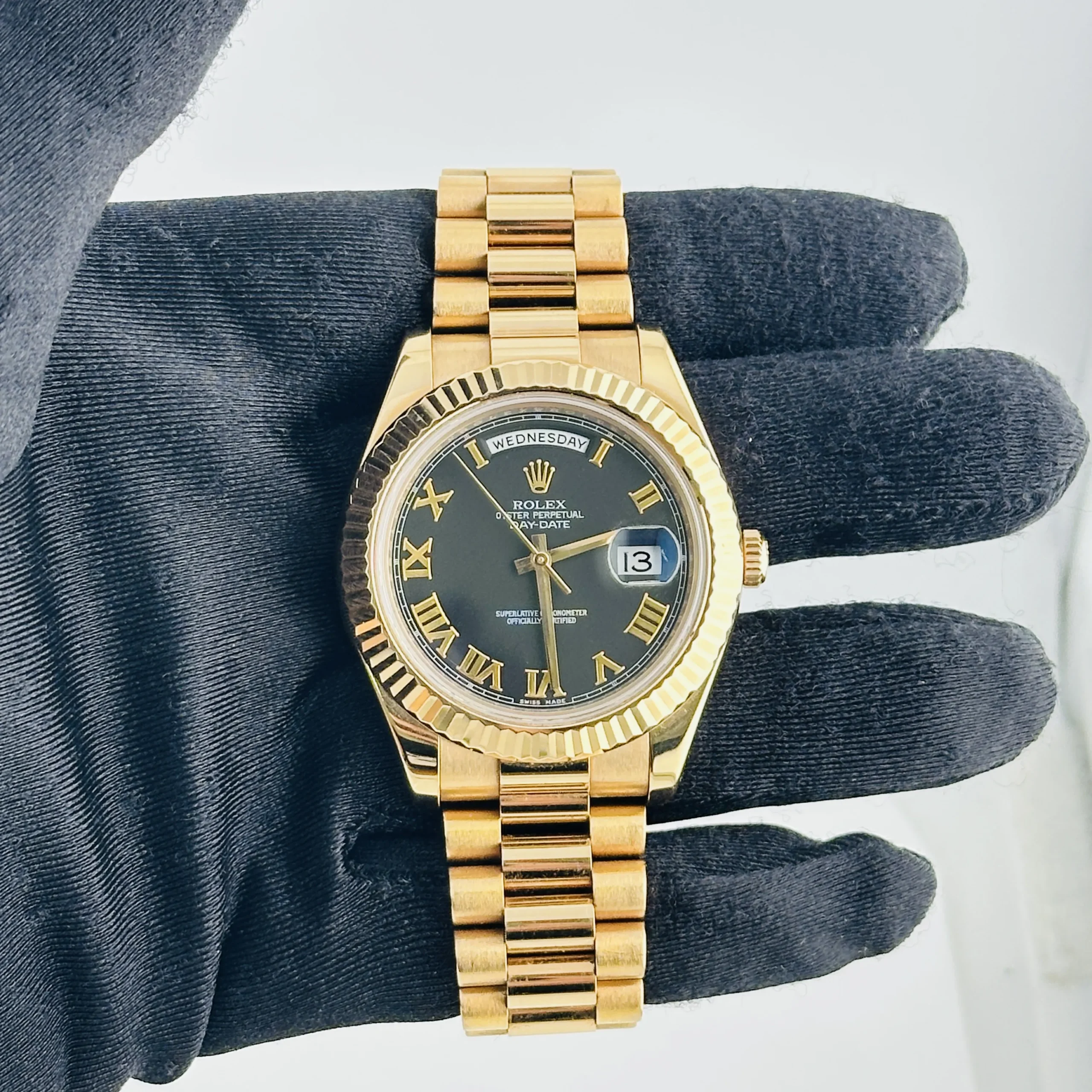 20048291_kja39bnkx0swt3u4w58frm81vpd6.webp Rolex Day-Date Black Roman Dial on President Bracelet Ref. 218235 with Card (Old Green) 2011 - Image 1
