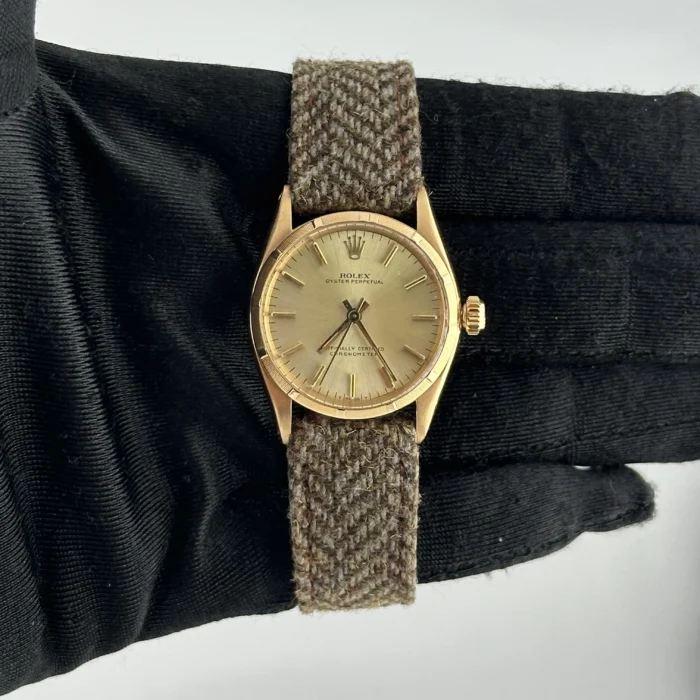 Rolex Oyster Perpetual Champagne Stick Dial on AM Fabric Ref. 6549 - Image 1