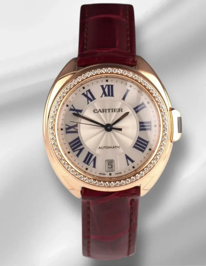 20252198_xdvc6ih2re6owxiy71ngu29o0txw.webp Cartier Cle Silver Roman Dial on Maroon Leather Ref. 3854 with Papers 2019 - Image 1