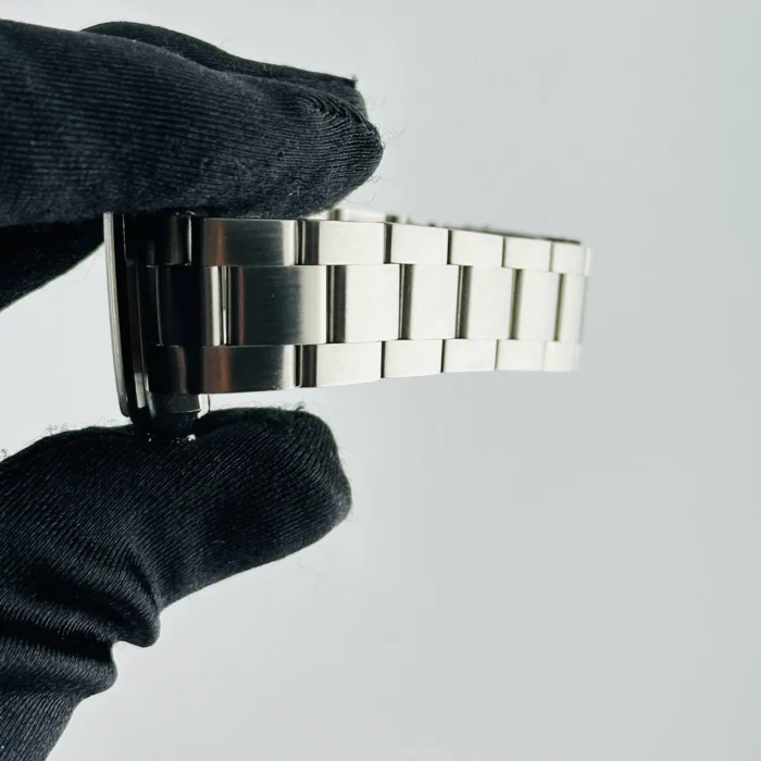 Rolex Oyster Perpetual Salmon / Arabic 3,6.9 Dial on Oyster Bracelet Ref. 77080 with Papers 2002 - Image 5