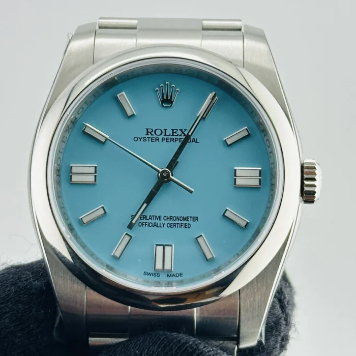 Rolex Oyster Perpetual AM Tiffany Stick Dial on Oyster Bracelet Ref. 116000 with Card (Old Green) 2014 - Image 2