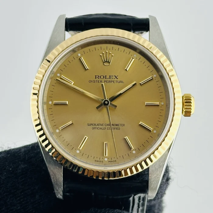 Rolex Oyster Perpetual Champagne stick Dial on Generic Leather Band Ref. 14233 - Image 1