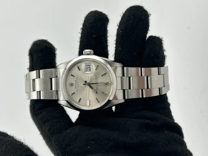 20927327_foo6cseloxmfyi5azcsroe4vxtsm.webp Rolex Oyster Perpetual Date Silver Index Dial on Oyster Steel Bracelet Ref. 1500 - Image 1