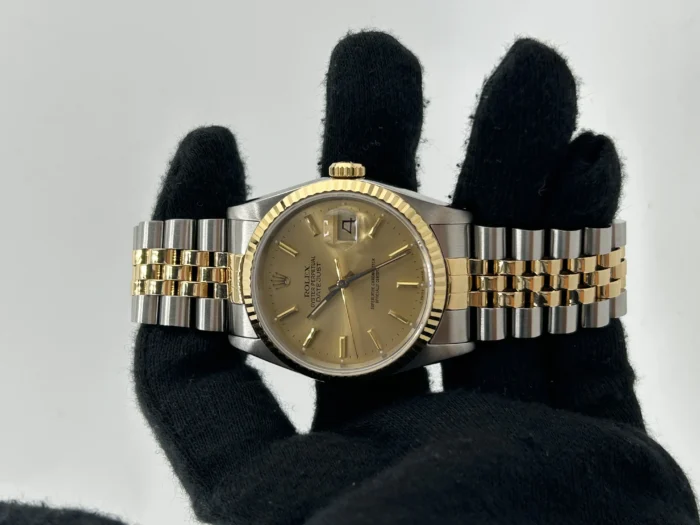 20930599_74oea8bxieybxogqcx1yyejccdpu.webp Rolex Datejust 36 Champagne Stick Dial on 2-Tone D-Link Jubilee Bracelet Ref. 16233 - Image 1