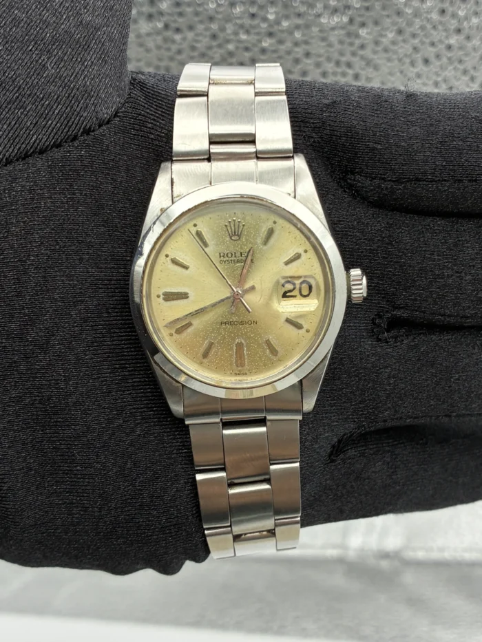 20944168_r9tq108dc5a031w70d3hcijt5wjy.webp Rolex Oysterdate Precision Silver Stick / Faded Dial on Oyster Bracelet Ref. 6694 with Papers 1976 - Image 1